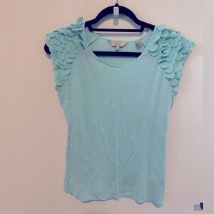 Ted Baker light green jersey top with scalloped detailing on cap sleeves